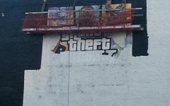 gta v cover art ad in nyc being painted